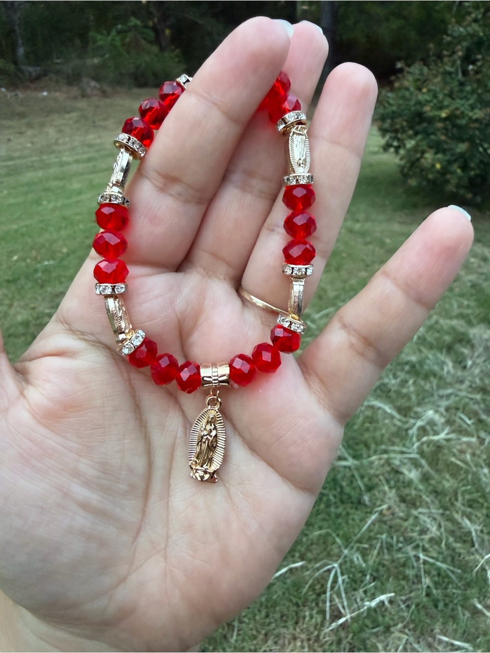 Red Virgin Mary Gold-Tone Bracelet with Red Faceted Beads